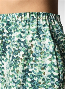 Mönstrad kjol i ekologisk bomull. Grön, blå, vit.