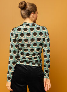 Prickig omlottblus, tröja trikå i omlott. Prickig turkos, svart, vit. K&US Kandus unik svensk design