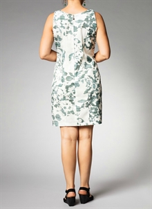 Klassisk klänning i ekologisk bomull. Vit med grönt mönster. K&US