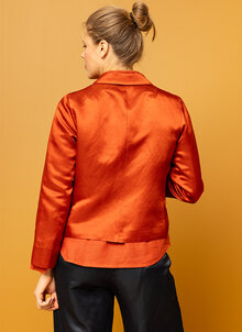 Orange glansig kavaj för fest. Festkavaj dam. K&US kandus damkläder södermalm stockholm