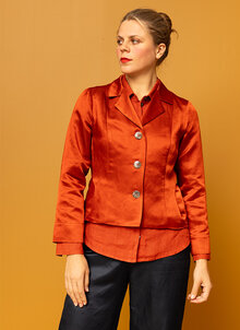 Orange glansig kavaj för fest. Festkavaj dam. K&US kandus damkläder södermalm stockholm