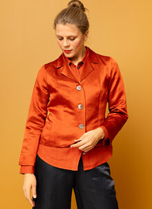 Orange glansig kavaj för fest. Festkavaj dam. K&US kandus damkläder södermalm stockholm